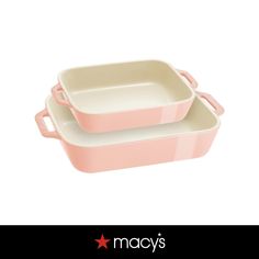 two pink casserole dishes sitting side by side on a white background with the words macy's written below it