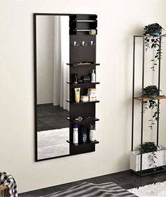 a mirror and shelf in a room