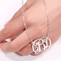 Jeulia classic sterling silver monogram necklace, this monogram necklace support three letters customized design for you chain with sterling silver, classic design and an exquisite design, makes your letter necklace become a beautiful and unique necklace. You can engrave your friends name or ‘Mom/Dad’ as a necklace gift in some special days. To express your love or friendship, never to be late to get your initial necklace with customized letter design online.Chain Type: Width: 30 mmHeight: 30 mm Stainless Steel Initials Name Necklace, Classic Monogram Initial Necklace For Anniversary, Elegant Silver Initial Necklace With Monogram, Elegant Silver Monogram Initial Necklace, Classic Sterling Silver Monogram Necklace, Classic Initials Name Necklace For Anniversary, Classic White Gold Monogram Initial Necklace, Classic Monogram Initial Necklace, Classic Monogram White Gold Necklace