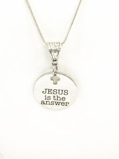 This is a beautiful Christian jewelry gift.  It has a stainless steel laser engraved charm with "Jesus is the answer" on it. This necklace is available on a silver-plated snake chain in your choice of 16, 18, 20, 22, 24, 26, 28 or 30 inches.  The pendant is also available for separate purchase if you have another necklace on which you would like to wear it.  Each item comes individually boxed and ready to give as a gift. This jewelry item has small parts and is not intended for children under the age of 13. Bible Jewelry, Bible Verse Jewelry, Bible Verse Necklace, Scripture Jewelry, Personalized Cross Necklace, Jesus Necklace, Christian Gifts For Women, Christian Necklace, Faith Jewelry