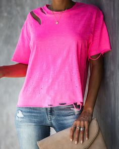 It's no joke with the Game On Cotton Distressed Tee! We've got a lightweight. heathered neon pink tee that sports a relaxed fit and semi cropped length. Cut with a crew neckline and short sleeves and moderate distressing! Finished with an unfinished hemline and sleeve hems to achieve the ultimate look. An edgy basic to style for summer + pre-fall! Styled with the Chloe Mini Necklace. Bali Necklace. Austin Distressed Skinny. Make A Scene Heels and Stella Crossbody Envelope Zip Clutch. Relaxed Fit Ripped Tshirt, Ombre Shirt, Distressed Tee, Pink Tee, Loose Shorts, Game On, Latest Updates, Sleeves Pattern, Ladies Tops Fashion