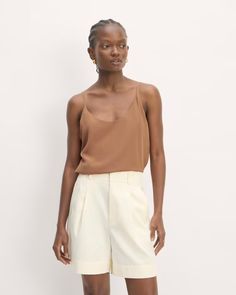 The Slip Cami Carob Brown – Everlane Chic Unlined Top For Daywear, Daywear Tank Top With Adjustable Straps, Cami Tank Top With Adjustable Straps For Daywear, Chic Viscose Sleeveless Tank Top, Chic Summer Tank Top With Delicate Straps, Chic Sleeveless Viscose Tank Top, Chic Spaghetti Strap Tank Top For Summer, Sleeveless Rayon Top For Daywear, Chic Scoop Neck Tops For Daywear