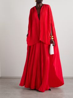 Brandon Maxwell's 'The Willow' gown is designed with a cape-effect overlay that creates the illusion of coordinating separates. It's cut from plissé-silk crepe de chine and has effortless, languid silhouette. Complement the striking shade of red with equally bold jewels - think emeralds or pink sapphires. Luxury Red Long Sleeve Sherwani, Red Dress Movement, Luxury Red Sherwani For Wedding, Luxury Silk Sherwani For Designer Wear, Luxury Bollywood Pre-draped Chanderi Saree, Luxury Jamawar Sherwani In Traditional Drape, Luxury Anarkali Bandhgala For Eid, Luxury Brocade Sherwani With Traditional Drape, Luxury Traditional Drape Sherwani For Spring