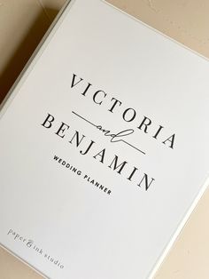 a wedding planner with the words victoria and benjamin on it's cover