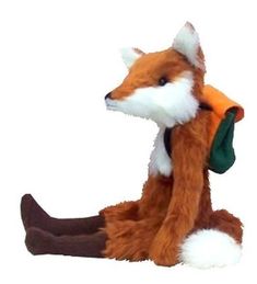 a stuffed fox with a backpack on it's back sits in front of a white background