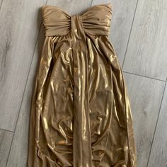 This Is A Beautiful Nye Or Holiday Dress Strapless With Built In Cups Size 8 But Size More Like A 6 Cache Brand Never Worn! Brand New. Gold Strapless Dress For Date Night, Gold Strapless Summer Dress, Gold Midi Dress For Summer Dinner, Gold Strapless Dress For Summer Evenings, Gold Strapless Dress For Summer Night Out, Gold Strapless Maxi Dress For Night Out, Strapless Gold Maxi Dress For Night Out, Gold Strapless Chic Dress, Strapless Gold Dress For Spring