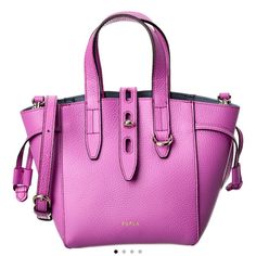 This Bag Is A Mini. Super Cute And This Color Is Hard To Find. 100% Authentic Furla. This Bag Is Selling For $600 Plus Depending On The Color. Depending On What Color The Prices Vary. This Pink I Have Is Very Popular And Limited. I’ve Added Listings So She Can See What The Colors Are Going For. My Last Pics Are Not In Good Light And Makes The Bag Look Darker It’s Definitely Like The Top 3 Pics. Purple Crossbody Satchel With Gold-tone Hardware, Purple Shoulder Bag With Gold-tone Hardware And Double Handle, Designer Purple Bags With Handles, Purple Shoulder Bag With Gold-tone Hardware For Shopping, Purple Top Handle Shoulder Bag With Gold-tone Hardware, Luxury Purple Satchel For Daily Use, Designer Purple Shoulder Bag With Handles, Purple Leather Shoulder Bag For Shopping, Purple Satchel With Gold-tone Hardware For Daily Use