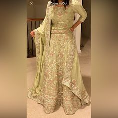 Intricately Embroidered Light Green Bridal Lehenga For Desi Wedding Occasions Worn Only To Show How It Looks Material: Silk Size: ~S To M (Will Update On Specifics Soon) Please Feel Free To Dm Me For More Details. Elegant Green Sharara With Floral Embroidery, Elegant Green Lehenga With Floral Embroidery, Floral Embroidered Gown With Traditional Drape For Reception, Traditional Drape Gown With Floral Embroidery For Reception, Wedding Sharara With Floral Embroidery For Diwali, Gown With Floral Embroidery And Traditional Drape For Reception, Floral Embroidery Sharara For Diwali Wedding, Floral Embroidered Sharara With Traditional Drape For Wedding, Silk Choli With Floral Embroidery For Wedding