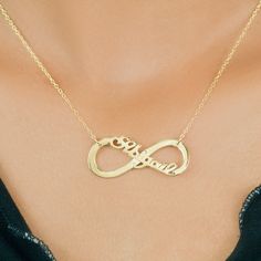 This Infinity with Name Necklace is available in Silver Plated, Gold Plated, Sterling Silver, 14K Gold over Sterling Silver. The Name Necklace comes with an 16" extendable to 18" link chain. The name pendant measures approximately 0.98" by 0.3" Yellow Gold Infinity Necklace With Adjustable Chain, Infinity Necklace With Adjustable Chain For Anniversary, Anniversary Infinity Necklace With Adjustable Chain, Gold Infinity Name Necklace For Mother's Day, Personalized Infinity Gold Necklace, Personalized Gold Infinity Name Necklace, Gold Infinity Necklace With Name, Personalized Gold Infinity Necklace, Mother's Day Gold Infinity Name Necklace