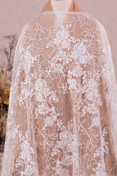 shimmery flower lace fabric Delicate Floral Embroidered Wedding Dress, Elegant Floral Embroidered Wedding Lace, Elegant Floral Embroidered Wedding Dress, Elegant Floral Embroidery Wedding Dress, Elegant Floral Embroidery Wedding Dress For Ceremony, Elegant White Wedding Dress With Floral Embroidery, Elegant Wedding Dress With Floral Embroidery, Elegant Wedding Dress With Floral Embroidery For Ceremony, Delicate Floral Embroidered Tulle Fabric For Wedding