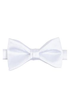 Bring versatility and distinction to any formal look with this pre-tied bow tie crafted in a solid color from smooth and silky satin. 2 1/4" width 22" length Pre-tied; adjustable 100% polyester Dry clean Imported Pre-tied Satin Bow For Black Tie Events, Classic Adjustable Bow Ties, Classic Pre-tied Decorative Bow, Standard Tie Satin Bow, Solid Color Wedding Tie With Satin Bow, Solid Wedding Tie With Satin Bow, Classic Adjustable Solid Color Bow, Classic Adjustable Solid Bow, Classic Pre-tied Satin Bow Tie