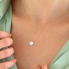 14k Solid Gold Double Heart Necklace  ★ ★ ★Description★ ★ ★ ✓ Material:  14k Real Solid Gold ✓ Available Gold Colors: Yellow Gold, White Gold and Rose Gold ✓ Available Chain Sizes: 14", 16", 18", 20" ✓ Charm/Pendant Size: Height: 0.2", Width: 0.2" ✓ Ready to Ship in 3-4 Business Days ✓ International ★FREE★ Express Shipping  ★ ★ Each order will be packed in a beautiful gift box★ ★  🎁 PERFECT GIFT 🎁 ➤ Suitable for all special occasions: ❤Birthday Gift ❤Anniversary Gift ❤Graduation Gift ❤Bridesma Dainty White Gold Lariat Necklace Gift, Dainty Lariat Necklace With Delicate Chain For Anniversary, Lariat Jewelry For Anniversary And Mother's Day, Dainty Lariat Necklace With Heart Charm As Gift, 14k Gold Lariat Necklace As A Gift, White Gold Pendant Lariat Necklace Gift, White Gold Pendant Lariat Necklace As A Gift, 14k Gold Lariat Necklace With Delicate Chain For Gift, 14k Gold Lariat Necklace With Adjustable Chain For Anniversary