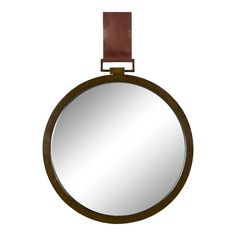 a round mirror with a brown leather strap around it's neck and back end