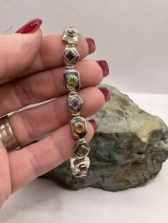 "Sterling Silver Gemstone Link Bracelet Amethyst Citrine Peridot Garnet 7.5\" 18.6g. Marked 925. Condition is very good, scuffs and scratches on the surface from wear. Thank you for looking! Prices on shop items are fair and reasonable, so all prices are firm. No reserves, all items sold as-is. Please review photos and description carefully before purchasing. Please let me know of you have any questions or special shipping requests such as postal insurance. Once an item is shipped and tracking i Chain Link Bracelet, Gold And Silver, Link Bracelets, Pandora Charm Bracelet, Chain Link, Citrine, Garnet, Insurance, Jewelry Bracelets