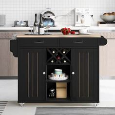 a kitchen island with an open shelf and wine bottle on the top is shown in this image