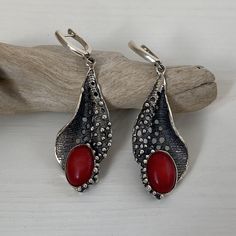 Handmade sterling silver earrings with natural red coral stone. Red coral earrings with pattern and granulation surface. The oval and red color of this coral stone gives magic and an unusual look to this design. made in Armenia by Shahinian Jewelry  Do you know? Coral is a symbol of modesty, wisdom, happiness, and immortality. It is commonly known to remedy spasms of the intestines, sleeplessness, and bladder stones. Coral can reduce stress and fears and combats foolishness, nervousness, fear, d Red Sterling Silver Earrings With Natural Stones, Unique Red Earrings With Natural Stones, Bladder Stones, Red Stone Earrings, Huge Rings, Red Coral Earrings, Tiffany Jewelry, Coral Stone, Coral Earrings