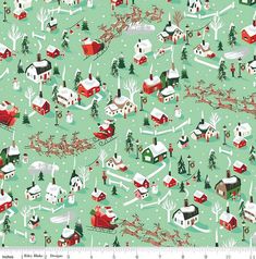 a green christmas fabric with red and white houses