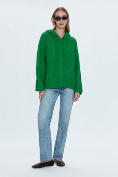 Relaxed fit hooded pullover sweater with an oversized silhouette. Crafted from a soft to the touch wool knit blend. Raglan shoulders with relaxed sleeves and curved hem. Tonal drawstring at neckline. Fern is a vibrant shade of green. 64% Acrylic / 13% Polyester / 8% Alpaca / 9% Nylon / 4% Wool / 2% Spandex Imported Cashmere Sweater With Drawstring Hood, Long Sleeve, Cashmere Long Sleeve Sweater With Drawstring Hood, Long Sleeve Cashmere Hoodie With Drawstring Hood, Long Sleeve Cashmere Sweater With Drawstring Hood, Cashmere Hooded Sweater With Drawstring, Fall Cashmere Sweater With Drawstring Hood, Cashmere Sweater With Drawstring Hood For Fall, Fall Cashmere Hoodie For Loungewear, Fall Cashmere Loungewear Hoodie