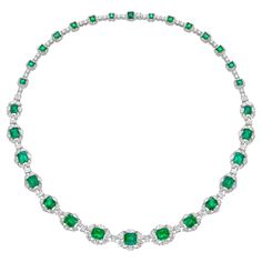 Radial Emeralds by Sunita Nahata Fine Design. This collection features vibrant green emeralds set on a bed of stunning White diamonds set in white gold. This is a dainty and delicate bridal necklace that still exudes a glamorous and luxurious look. Emerald Necklace in 18Karat White Yellow Gold with White Diamond. Emerald: 1.52 carat, 7.30X6.50X4.60mm size, octagon shape. Emerald: 1.31 carat, 7.10X6.00X4.30mm size, octagon shape. Emerald: 1.09 carat, 6.80X6.00X4.10mm size, octagon shape. Emerald: Luxury White Gold Emerald Necklace With Brilliant Cut, Luxury White Gold Brilliant Cut Emerald Necklace, Luxury Hand Set Emerald Necklace For Anniversary, Luxury Emerald Cut Emerald Necklace For Anniversary, Luxury Emerald Cut Emerald Necklace With Diamond Accents, Luxury Hand Set Round Emerald Necklace, Luxury Hand-set Round Emerald Necklace, Exquisite Green Jewelry With Pave Setting, Luxury Emerald Cut Brilliant Emerald Necklace