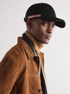 Paul Smith's baseball cap is trimmed with 'Artist Stripe' grosgrain next to the curved brim. Made from wool-felt, it has air-ventilating eyelets around the crown and a branded buckle in the back for the perfect fit. Felt Baseball, Cap For Men, Wardrobe Edit, Baseball Caps Mens, Fine Jewelry Designers, Paul Smith, Mr Porter, Black Wool, The Crown