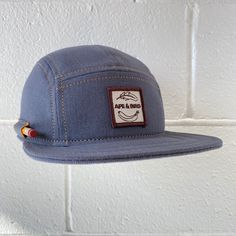 ✎Handmade cap with pencil holder ✎DETAILS: 5 panel cap is handmade from your choice of denim or canvas. Sewn with golden or black heavy duty top stitch thread. Patch, brim and hardware made in the USA. The brim is not a bought plastic insert. Brims are handmade here in house, they are shorter and softer than typical hats. They are super comfortable yet still completely hand washable and incredible durable. Hand built by two human makers ( apes/April & bird/Rich) with love, care and pride here in Rhode Island USA. Never bought and rebranded. #NotSweatshopShit ✎PENCIL OPTIONS: Pick from left or right for side . And choose from regular/ standard pencil or flat pencil/ sharpie holder for size. Or none for no holster. ✎IMPORTANT: Check shop announcements for current make times. Caps are as is, Adjustable 5-panel Fitted Hat For Outdoor, Adjustable Hat With Curved Brim For Everyday Use, Adjustable Snapback Hats For Everyday Use, 5-panel Adjustable Snapback Hat For Camping, Adjustable Six-panel Hat For Camping, Adjustable 5-panel Snapback Hat For Camping, Five Panel Hat, 5 Panel Hat, Five Panel