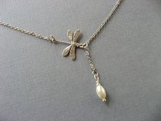 This pretty necklace features a tiny 17mm dragonfly suspended from an 17” silver plated chain. This can be worm casually with a tee or as a sophisticated necklace for more formal occasions. If you prefer a different length, just let me know in the note to seller during checkout. All Delicate Adjustable Nickel-free Charm Necklaces, Delicate Adjustable Nickel-free Charm Necklace, Adjustable Delicate Nickel-free Charm Necklace, Elegant Adjustable Dragonfly Jewelry, Elegant Adjustable Dragonfly Necklace, Elegant Dragonfly Jewelry For Wedding, Adjustable Sterling Silver Dragonfly Necklace, Nickel Free Adjustable Charm Necklaces For Wedding, Adjustable Nickel-free Charm Necklaces For Wedding