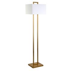 a gold floor lamp with a white square shade on the base and a light bulb at the end