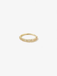 All great things come in dainty packages, especially when you take home this stackable ring. Our Darcy ring is dipped in 14K gold and features a mixture of baguette-cut and round-cut cubic zirconia gemstones. This stackable ring obviously loves company, so pair Darcy with bold rings, dainty rings, maybe some silver ringsthe choice is yours.  Dipped in 14K gold  Set with a variety of cubic zirconia gems  365-day warranty Everyday Yellow Gold Stackable Rings With Vs Clarity, 14k Gold Stackable Crystal Open Ring, Everyday Gold Stackable Initial Ring, Gold Stackable Initial Ring For Everyday, Gold Half Eternity Crystal Ring Gift, Gold Crystal Half Eternity Ring - Gift, Everyday Stackable 14k Gold Crystal Ring, 14k Gold Open Ring Stackable Half Eternity Rings, Delicate Stackable Yellow Gold Crystal Ring