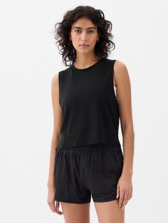 Soft, breathable cropped muscle T-shirt.  Crewneck.  Sleeveless.  * Fit: Relaxed.  A straight & easy fit.  * Style Note: For a more Classic fit, go down one Muscle T Shirts, Gap Fit, Women's Activewear, Muscle Tees, Fit Style, Womens Activewear, Mix Match, Jean Coat, Trending Accessories