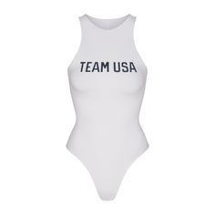 a white swimsuit with the words team usa printed on it's chest and back