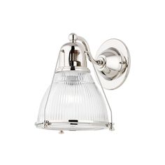 a chrome wall light with a clear glass shade