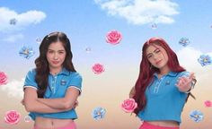 two young women standing next to each other in front of pink roses and blue sky