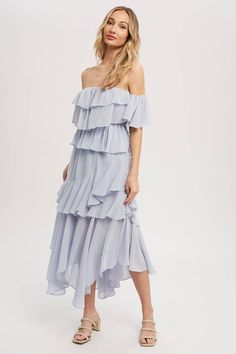 This sweet woven midi dress features an off the shoulder neckline, elastic waist, asymmetrical tiered ruffle skirt design, flowy silhouette. -Model is 5'9" and wearing a Small