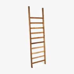 a wooden ladder against a white background