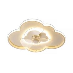 a white flower shaped light fixture on a ceiling