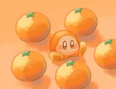 some oranges are arranged in the shape of mario kart