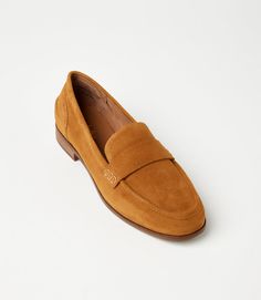 These Penny Loafers offer both comfort and style for your everyday wear. With a low heel and round toe, they are perfect for transitioning from work to a casual day out. These versatile shoes are a must-have addition to your wardrobe. Runs 1/2 big; we recommend next size down Leather Heel height: .75" Soft insole Easy slip on Imported Seychelles | Karen Kane Suede Penny Loafers in Tan, Size 6.5, Plain 75 Soft, Versatile Shoes, Karen Kane, Suede Material, Penny Loafers, Seychelles, Black And Tan, Low Heels, Leather Heels