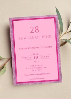 a pink birthday party card with the number 28 printed on it and some green leaves