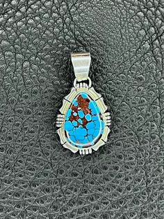 Gorgeous blue American Turquoise set in sterling silver by a Native American artist. The shade of blue in this stone isn't seen often these days. A definite collectors piece! Signed. Learn more about our shop at www.golddoorpdx.com follow us on Facebook or Instagram for more! Native American Artists, Native American Turquoise, American Turquoise, Turquoise Pendant, Shades Of Blue, Pendant Necklaces, Portland, Nativity, Native American