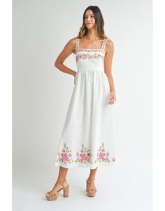 Stun in this gorgeous embroidered maxi. Features a linen blend fabric and bright floral embroidery on the bust, straps, and skirt. Maxi length Stretch smocked back Lined bust, unlined skirt Embroidered floral detailing Fabric: rayon/linen/poly SIZE GUIDE Measurements are approximate and taken while laying flat across the front. Not doubled. Small - Bust: 14”Waist: 13”Length: 50” Medium -Bust: 15”Waist: 14”Length: 50” Large - Bust: 16”Waist: 15”Length: 50” TRY-ON Feminine Cotton Midi Dress With Floral Embroidery, Garden Party Cotton Maxi Dress With Smocked Bodice, Cotton Maxi Dress With Smocked Bodice For Garden Party, Spring Cotton Midi Dress With Floral Embroidery, Cotton Maxi Sundress With Floral Embroidery, Cotton Sundress With Floral Embroidery, Spring Cotton Maxi Dress With Square Neck, Spring Maxi Dress For Garden Party With Straight Neckline, Cotton Midi Dress With Floral Embroidery For Brunch