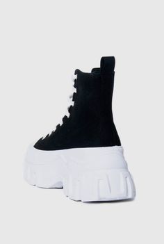 Black Chunky Platform High Top Sneakers With laces. Black Sporty Sneakers With White Laces, Sporty Black Sneakers With White Laces, Sporty Wedge Sneakers With Lug Sole For Streetwear, Trendy Black Chunky Sneakers With Lug Sole, Edgy Lug Sole Platform Sneakers For Streetwear, Edgy High-top Sneakers With Contrast Sole, Edgy Platform Sneakers With Lug Sole For Streetwear, Sporty High-top Sneakers With Lug Sole, Edgy Streetwear Platform Sneakers With Lug Sole