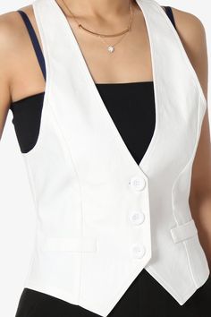 Complete ready-to-wear line that has found favor by adding an urban edge to feminine tailoring. Styled like his, with princess seaming for a more feminine fit. Whether alone under a blazer or worn over a buttons shirt, it's a powerful style play.Women's stretch woven + racerback slim-fitting vestSleeveless styling, V-neck with 3 button closure, Deep V neckFaux welt pockets, pointed hem, Adjustable back waist strap, UnlinedFits true to US size, take your normal size, S = Size(4-6), M = Size(8-10) Vest Uniform, School Dance Team, Dressy Vest, 3 Button Suit, Kurti With Jeans, Plus Zise, Suit Waistcoat, Tuxedo Suit, Stylish Clothes For Women