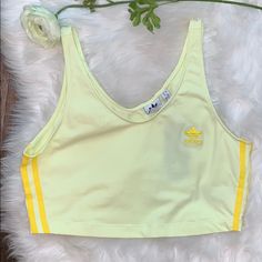 Nwt Excellent Condition Adidas Crop Tank Pastel Yellow Women's Large Adidas Cotton Tank Top For Spring, Adidas Casual Summer Tank Top, Casual Adidas Summer Tank Top, Yellow Sports Tank Top For Spring, Yellow Tank Top For Sports In Spring, Adidas Green Top For Spring, Green Adidas Top For Spring, Long Sports Bra, Black Crop Sweatshirt