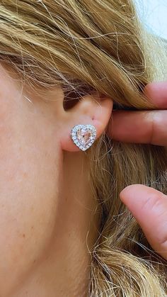 This design is so elegant and flirty she will never take these off her ears. It can become her favorite ones in the jewelry box. Metal: 18K White GoldDiamond Weight: Pave 0.35ct tw Diamond Shapes: 36 Round Brilliant Diamonds / 2 Morganite 2.12ct twMeasurements: 11mm x 11mmBacking: Push Back Diamond Heart Earrings, Brilliant Diamond, Diamond Heart, Morganite, Heart Earrings, White Gold Diamonds, Round Brilliant, Diamond Shapes, Gold Diamond