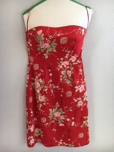 "Fabulousness in a spring/summer semiformal dress! I loved wearing this to both my high school + college graduations. I felt feminine, bold, and ready to take on the world! A simple sheath dress, yet soft floral print layered over bold red backdrop, paired w/ scalloped red stitching along upper bodice + hem...gives it more of a unique + refreshing feel. AND it was Y2K, so you HAD to add in Chinese characters for good measure! Actually, apparently this designer enjoyed incorporating her Chinese heritage in her work, so I'm sure that was the REAL reason. Fair Vintage Condition No tears, all seams sturdily still intact, and little wear to fabric. A well constructed, fully lined dress. It does have several stains on front of skirt (see photos). While stains blend relatively well amidst the bol Summer Homecoming Mini Dress With Fitted Bodice, Floral Print Mini Dress For Summer Homecoming, Red Summer Dress For Homecoming, Summer Homecoming Mini Dress With Floral Print, Red Dress For Summer Homecoming, Red Dresses For Summer Homecoming, Red Homecoming Summer Dress, Red Vintage Dress For Date Night, Red Mini Dress With Fitted Bodice For Spring