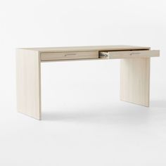 a white desk with two drawers on the top and one drawer open to reveal something