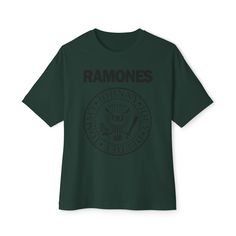 🤘 Rock out in style with our oversized t-shirt featuring the legendary rock band Ramones! 💥 Comfort and style collide in these custom boxy t-shirts. Their relaxed fit and dropped shoulders offer a modern aesthetic that's perfect for any occasion. 🎸 Crafted from 100% airlume, ring-spun, and combed cotton, these shirts are incredibly soft for maximum comfort. (Athletic Heather is 90% airlume combed and ring-spun cotton, 10% polyester) 🤘 Whether you're hitting a concert or just chilling with friends, our oversized tee will keep you looking cool and feeling comfy all day long. Add it to your wardrobe and rock on with the Ramones! 🎶 Garment Info:✨Unisex oversized boxy tee is soft and durable!✨Medium fabric (6.0 oz/yd² (170 g/m²)) ✨Relaxed fit ✨Tear away label ✨100% Airlume combed and ring- Rock Band Logo T-shirt Relaxed Fit, Rock Band Logo T-shirt In Relaxed Fit, Rock Style Band Logo T-shirt With Relaxed Fit, Rock Style Band Logo T-shirt In Relaxed Fit, Rock Style T-shirt With Logo For Concerts, Rock Style Graphic Design Short Sleeve T-shirt, Green Graphic Tee For Concert, Relaxed Fit Rock T-shirt With Screen Print, Trendy Band Logo T-shirt In Relaxed Fit