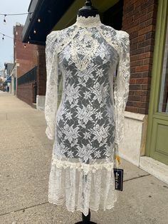 "90s vintage, Victorian inspired lace dress. New with original tags. Measurements: 36\" bust 32\" waist 38\" hip 44\" length" Cream Lace Mini Dress With Lace Patchwork, Cream Lace Patchwork Mini Dress, Feminine Fitted Lace Dress With Lace Sleeves, Feminine Fitted Dress With Scalloped Lace, Fitted Cream Mini Dress With Lace Trim, Feminine Fitted Lace Dress With Scalloped Detail, Feminine Fitted Scalloped Lace Dress, Feminine Fitted Lace Dress With Scalloped Lace, Fitted Knee-length Lace Dress With Lace Top