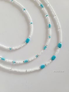 Blue minimalistic beaded summer necklace/chocker is made with ink and white high-quality Czech seed beads. It looks beautiful by itself or can be layered with other necklaces. I hope you enjoy wearing my jewelry as much as I enjoy making them! This trendy necklace/chocker is a great addition to your beach look.   Let me know if you need your order to be shipped out faster. I will try my best to accommodate your needs. ♥ The best gift you could give to yourself or your friend. ♥  ↠ ABOUT    ▢  Si Summer Necklace Beach, Beaded Chocker, Summer Beach Jewelry, Diy Jewelry Unique, Coastal Granddaughter, Trendy Necklace, Beaded Crafts, Idea Gift, Handmade Wire Jewelry