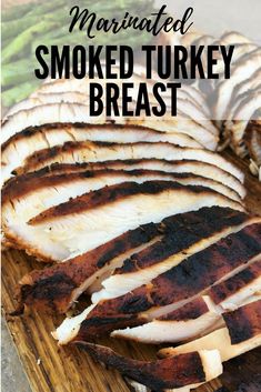 sliced turkey breast on a cutting board with text overlay that reads marinated smoked turkey breast